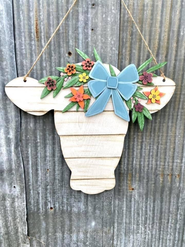 Cow door hanger