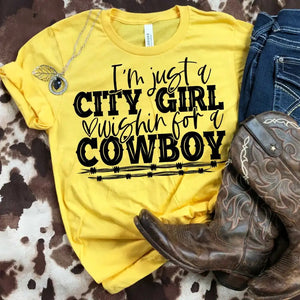I'm just a city girl wishin for a cowboy